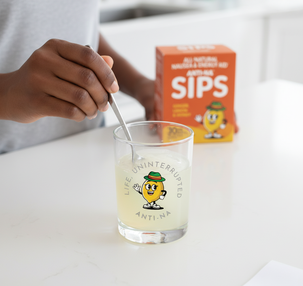 Young Black woman stirring Anti-na SIPS drink